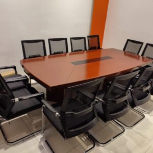 2.4m x 1.2m boardroom table with sleek surface and sturdy legs