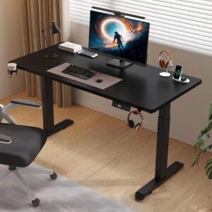 Black electric adjustable standing desk with motorized height control, sturdy steel frame, and spacious black tabletop for office or home workspace.