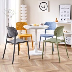 Retro plastic stackable chair with ergonomic molded seat made from durable polypropylene plastic suitable for modern home and commercial seating.