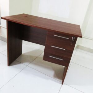 1.4m study office table with laminate finish, sturdy legs, and spacious workspace for home or office use.