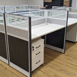 4-seater grey office workstation with modern design for collaborative office work.