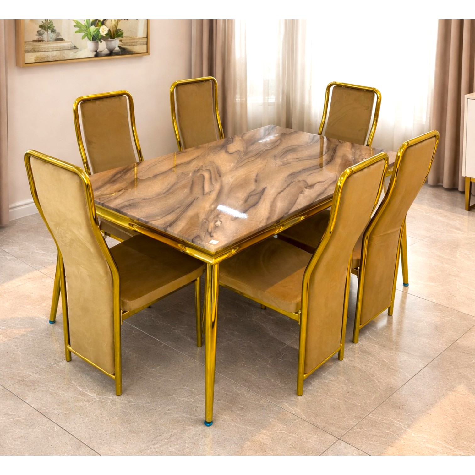 6-seater marble dining table with gold frame and upholstered chairs in a modern dining setup