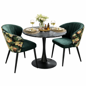 Elegant bistro dining set with black marble round table and green velvet chairs featuring tropical patterned backs and black legs.