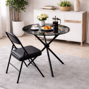 Compact dining table with chair in a small modern dining setup