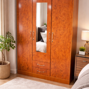 Elegant wooden wardrobe with full-length mirror in a modern bedroom setup.