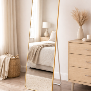 Full length dressing mirror with slim metallic frame in modern bedroom setup