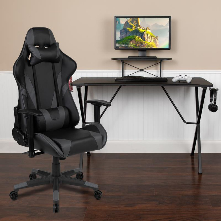 Grey reclining gaming chair with ergonomic cushions and adjustable armrests