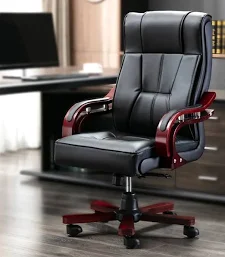 Modern executive office chair with black upholstery, wooden armrests with full-length padding, and chrome base