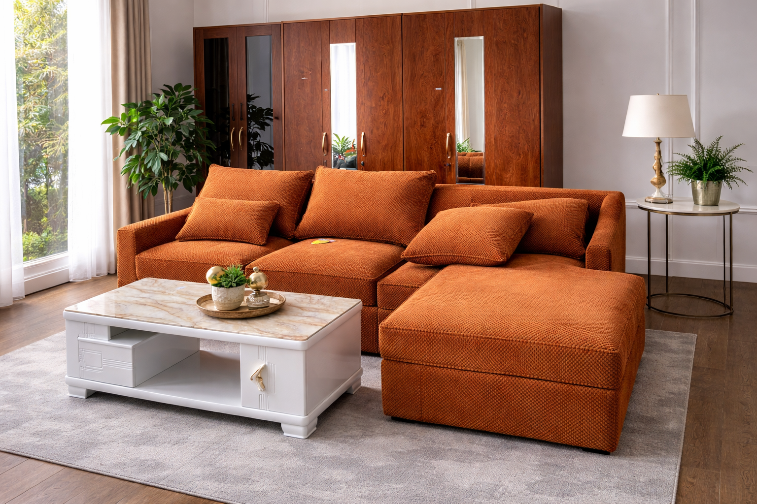 L-shaped 5-seater burnt orange couch with HD cushions in a modern living room setup