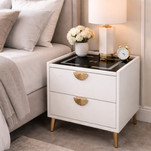 Modern LED bedside table with wireless charging, white finish, gold handles, and drawers in a stylish bedroom setup.