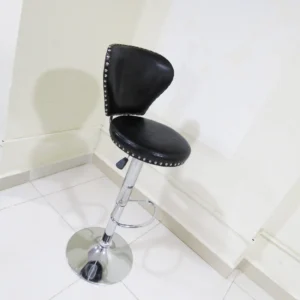 Black leather swivel barstool with padded seat, chrome base, and adjustable height for kitchen counters and bars