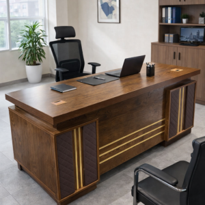 Luxurious executive office table with wooden finish, gold accents, leather panels, and modern office setup.
