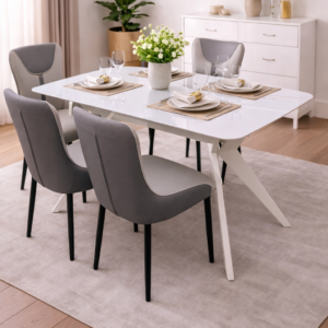 Modern 4-seater dining set with a sleek white table and minimalist chairs in a stylish dining room setup.
