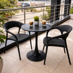 Modern 2-seater balcony bistro set with black round table and woven chairs on a stylish outdoor balcony.