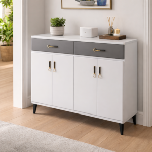 Modern console table with white and grey finish, gold handles, storage drawers, and stylish hallway setup.