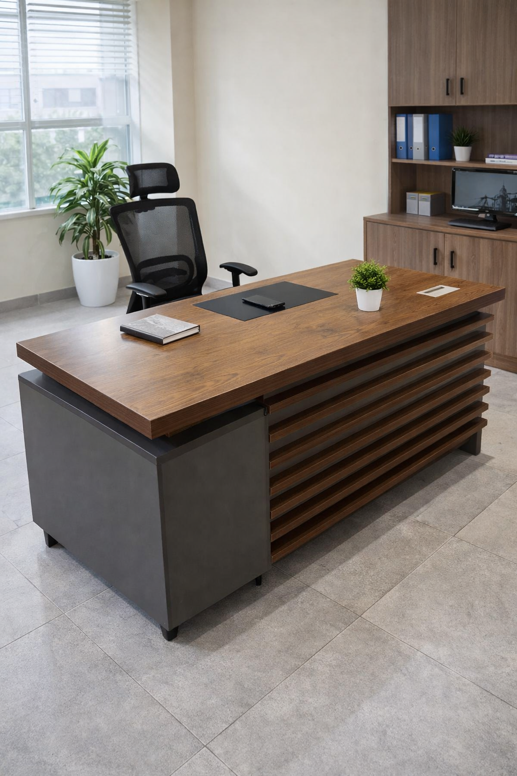 Modern executive office table with wooden finish, storage drawers, and sleek contemporary office setup.