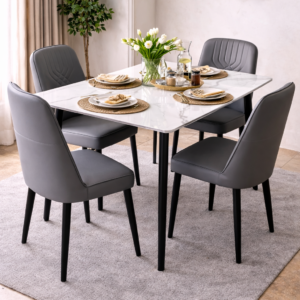 Pure marble 4-seater dining table with upholstered chairs in a modern dining setup.