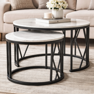 round pure marble nesting tables with black metal frames in a modern living room setup