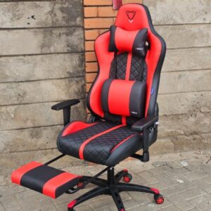 Red reclining gaming chair with ergonomic design and padded armrests.