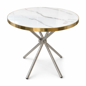 Round marble-top table with gold trim and modern metallic cross-leg base on a white background