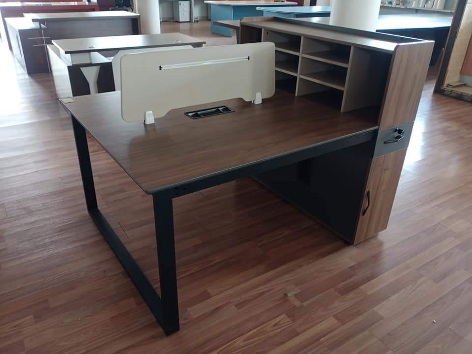 Two-way office workstation with side shelves, spacious desk surfaces, and durable frame for offices and home workspaces