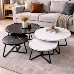 Wooden nesting tables with modern design and metal legs arranged in a stylish living room setup.